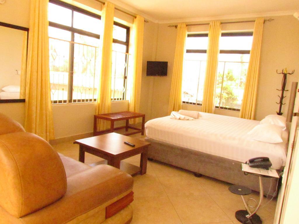 Fq Hotel Limited Дар-ес-Салам Номер фото